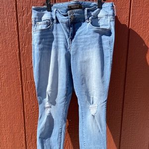 Jeans light blue with destruction around knee. Size 16 from Torrid